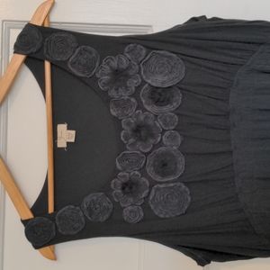 Black knee length sleeveless dress with floral texture